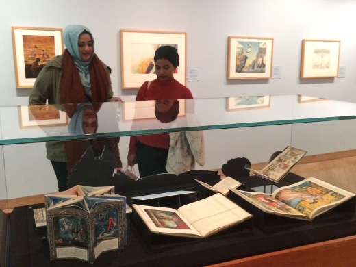 Antique illustrated books on display